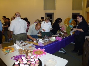 Volunteers enjoying the goodies.