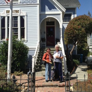 Mary in front of house